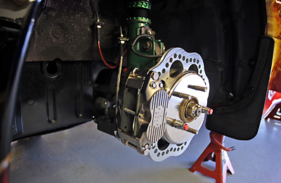 Front Left brakes showing the Brakeman F3 tornado calipers and revolution rotors.
